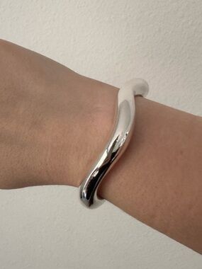 Sleek Curved Silver Bangle Bracelet